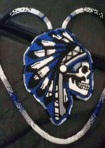 Mohawk skull medallion
